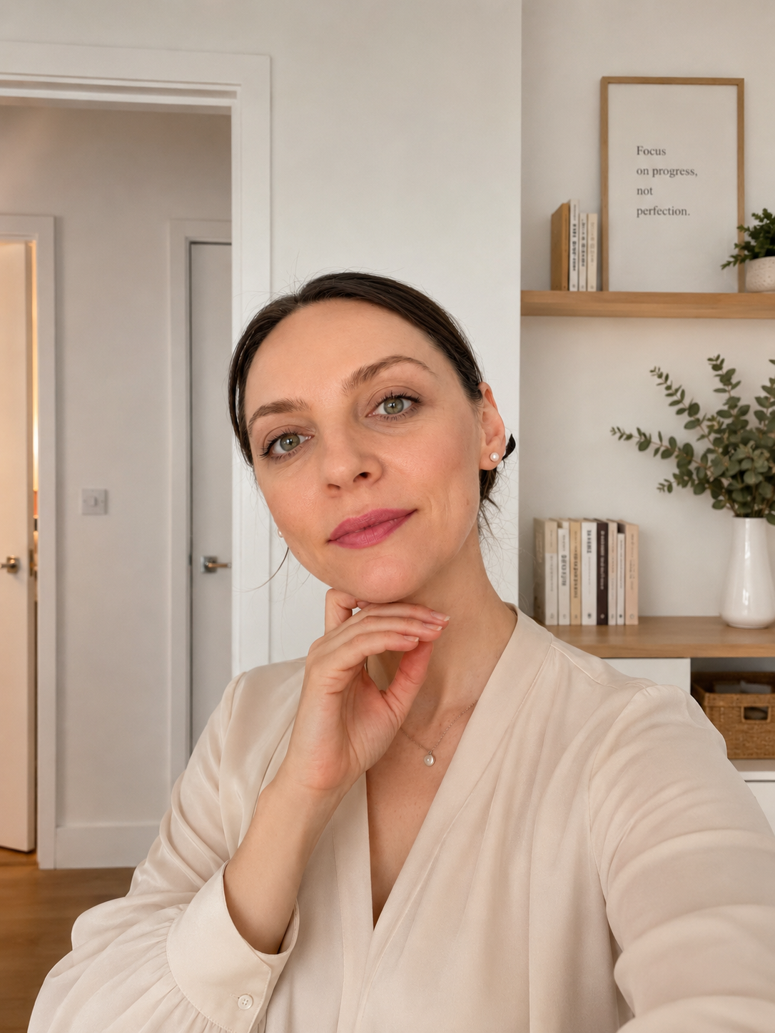 Ivelina at home, looking directly at the camera in a quiet moment